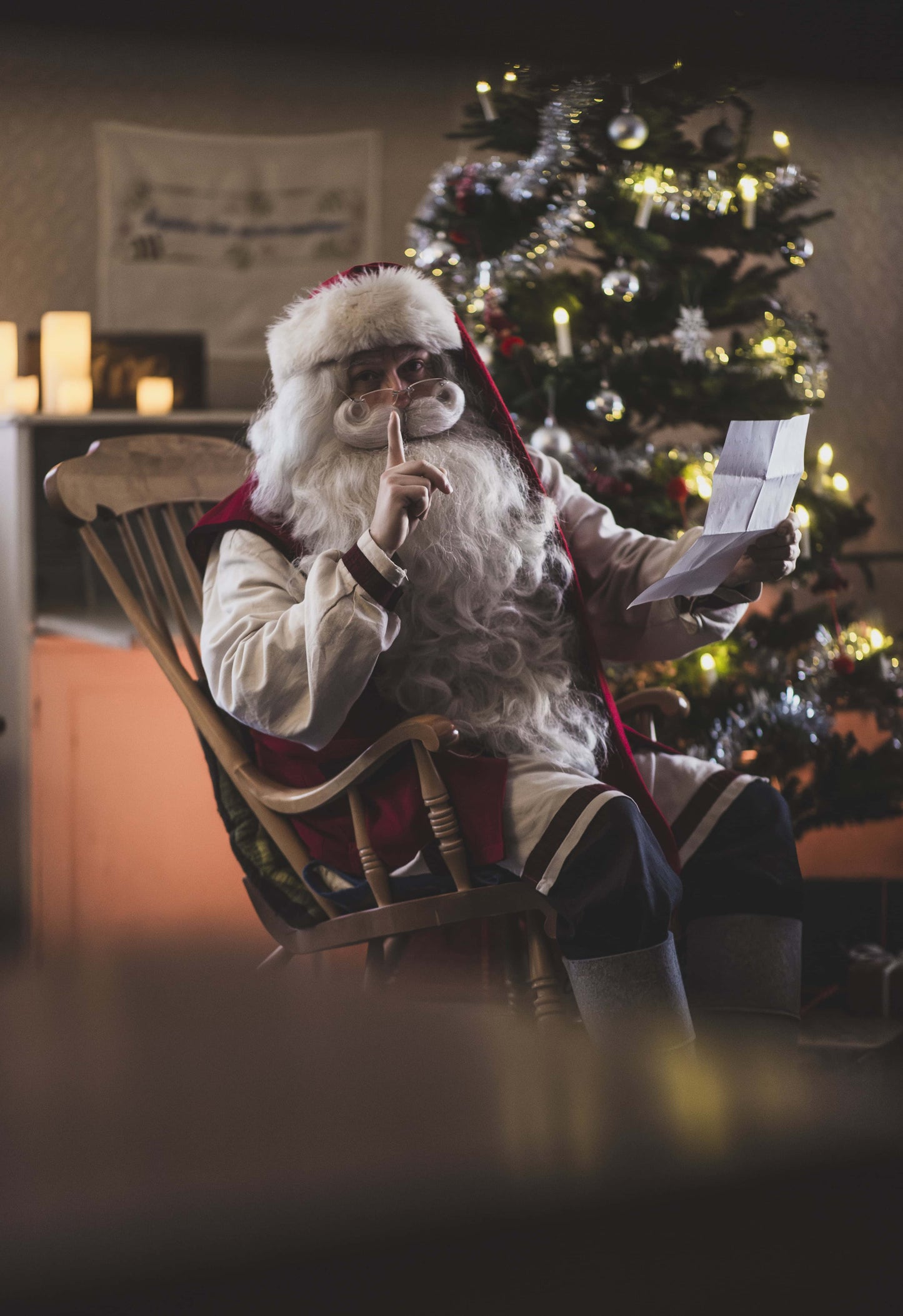 Moment with Santa - Santa Claus keeping a gift list secret