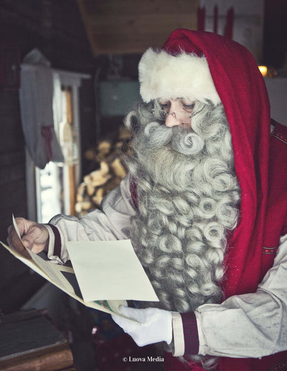 Moment with Santa - Santa Claus reading a letter